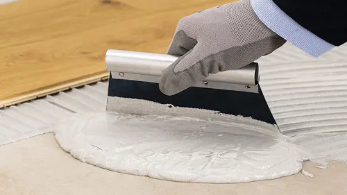 All the benefits of a lightweight adhesive to install wood flooring